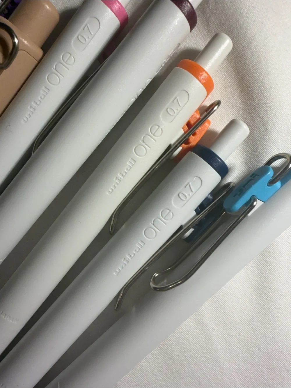 Uni-ball One 0.7mm Retractable Gel Pen - White Barrel with Assorted Accents
